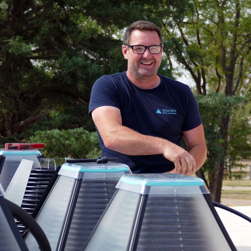 Kris Aitchison installing SolarisKit solar collectors